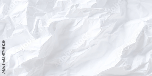 White wrinkled paper texture background with soft light shadows and natural folds for realistic design or mockup use