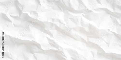 White wrinkled paper texture background with soft light shadows and natural folds for realistic design or mockup use