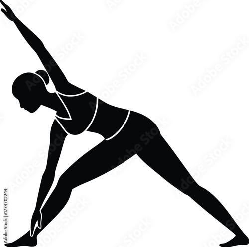 Silhouette of woman in yoga triangle pose exercise