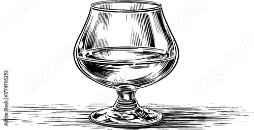 Vintage brandy snifter glass with reflective liquid - etched design for card or poster