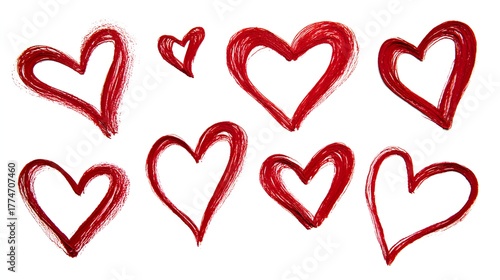 Collection of red hand-drawn hearts with textured brush strokes on white