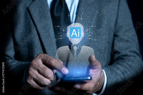 Businessman using smart phone with digital AI human head and brain circuit CPU chip symbol. Futuristic digital network technology, innovation. AI Learning and Artificial Intelligence concept.