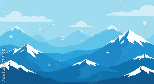 Serene winter mountain landscape with snow capped peaks under a cloudy blue sky