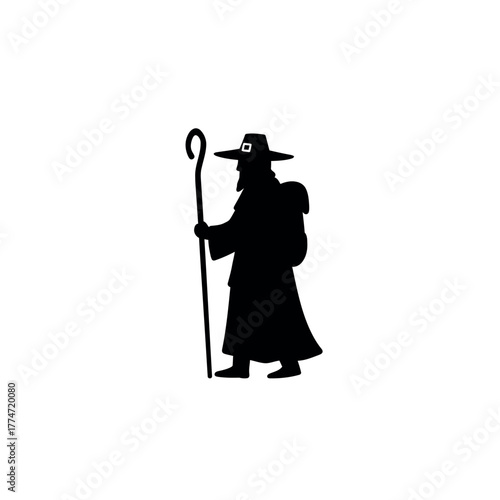 Pilgrim Silhouette with Staff and Backpack.