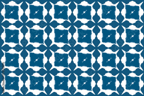  Ikat pattern in blue tones, hand-painted ethnic textile design with soft geometric shapes and indigo hues. Perfect for fabric prints, fashion design, or bohemian backgrounds.