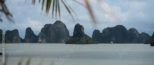 Ha Long Bay Vietnam with karst formations and cruise boat