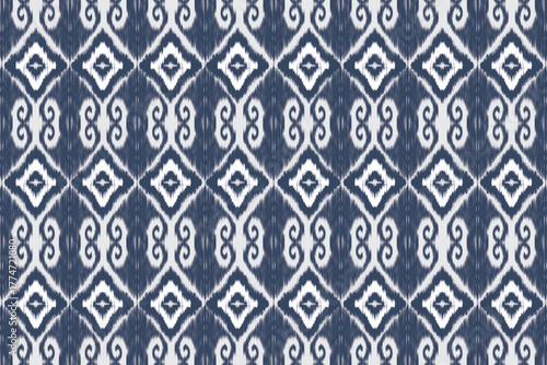 Watercolor Ikat pattern in blue tones, hand-painted ethnic textile design with soft geometric shapes and indigo hues. Perfect for fabric prints, fashion design, or bohemian backgrounds.
