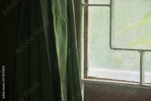 light spreading through window and curtain on home texture and background
