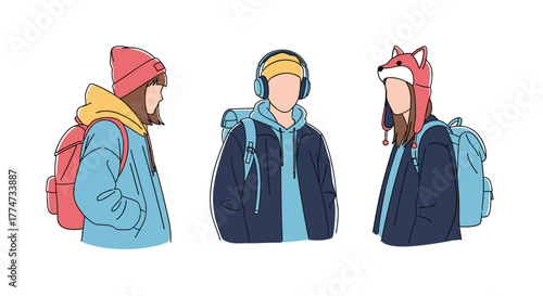 Three anonymous young people with backpacks and casual winter clothing, ready for travel or school, standing against a white background.