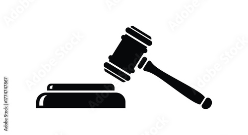 Black silhouette of a judge s gavel and sounding block isolated on a white background representing justice and legal proceedings