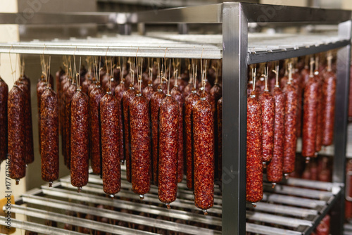 Smoked sausage production line in the factory