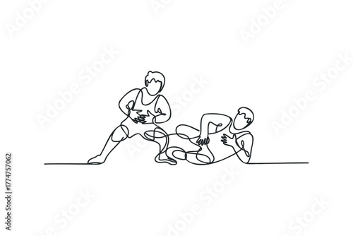 Two wrestlers engaged in grappling match