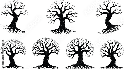 Collection of artistic black and white leafless tree silhouettes, twisted trunks and spreading branches,