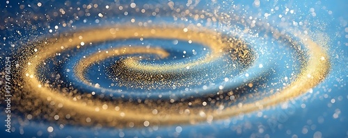 A mesmerizing swirl of golden particles creates an enchanting effect against a shimmering blue backdrop, evoking a sense of motion and tranquility.