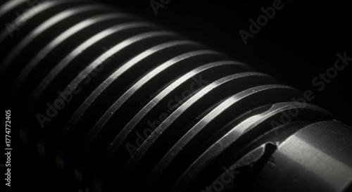 Precision engineering shines in this captivating metal screw detail perfect for technical applications