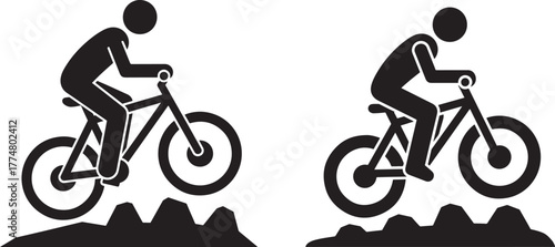 Two cyclists performing jumps on mountain bikes silhouette