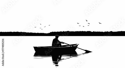 Silhouette of a lone rower on a calm lake.