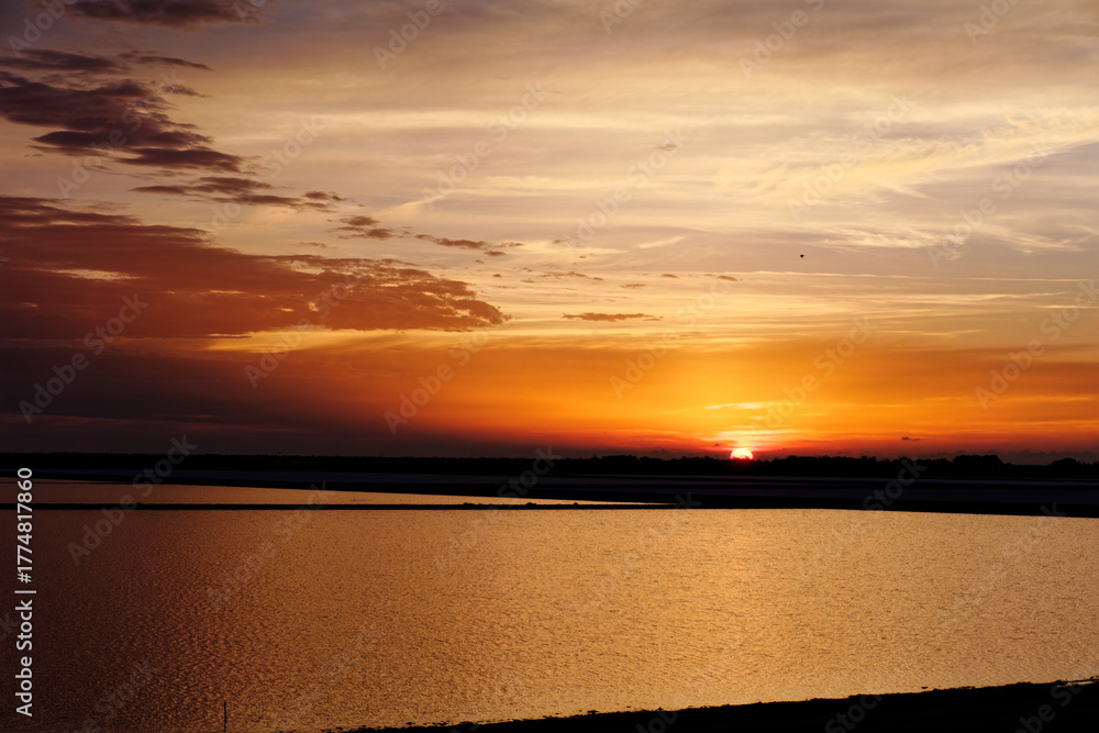 Obraz premium Sunset over salt pond 