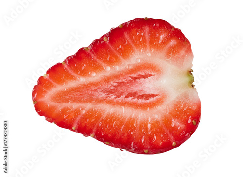 Red, Ripe Delight: An eye-level shot captures a fresh, juicy strawberry, bisected to showcase its vibrant, textured interior, a testament to nature's delicious simplicity.