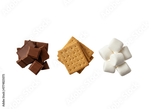 S'mores Ingredients: An appetizing arrangement of delectable s'mores ingredients including squares of rich chocolate, graham cracker and soft marshmallow.