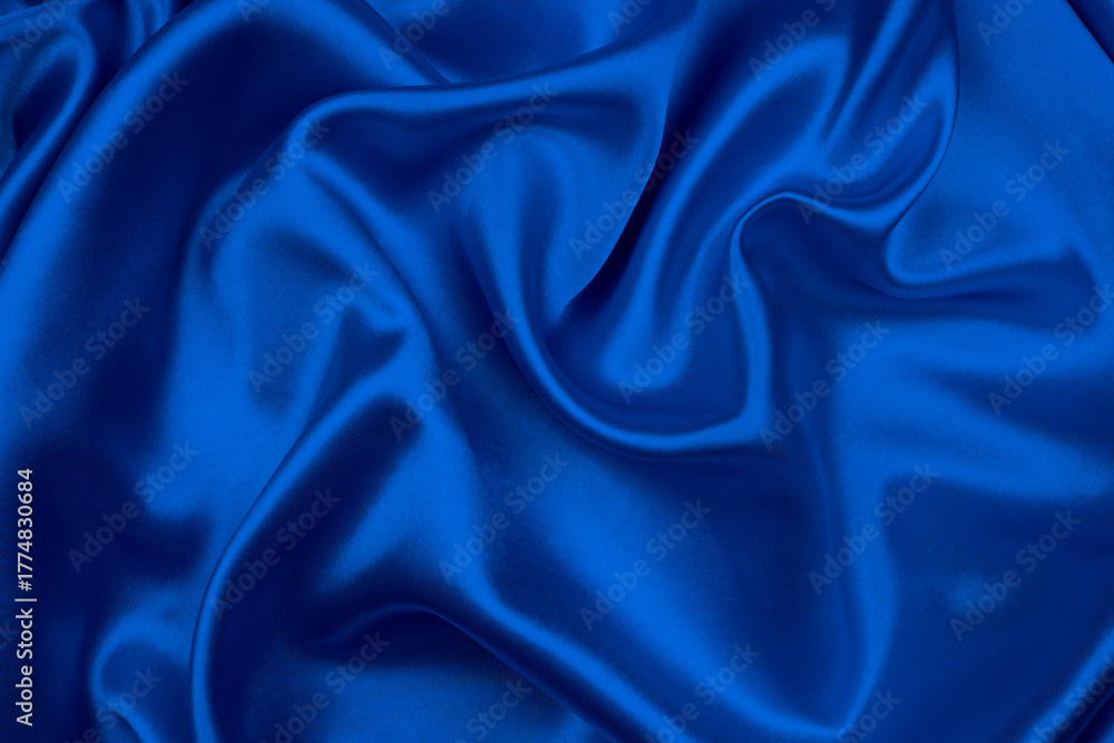 Obraz premium Smooth elegant blue silk or satin texture can use as abstract background.
