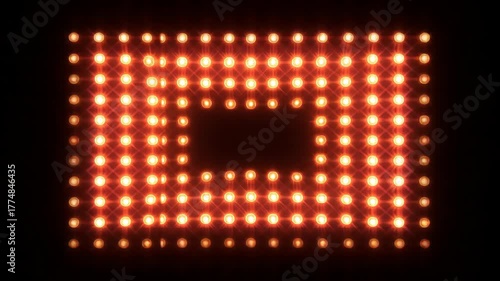 A grid of glowing orange-red lights with a dark rectangular void in the center, on a black background