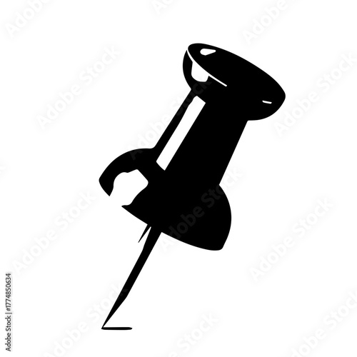 A black push pin standing upright on a plain surface from a slightly angled viewpoint