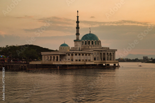  The floating mosque of Kuching, also known as Masjid Bandar Kuching or Masjid India, at sunset, located on the Sarawak River in Kuching, on the island of Borneo, Malaysia. 
