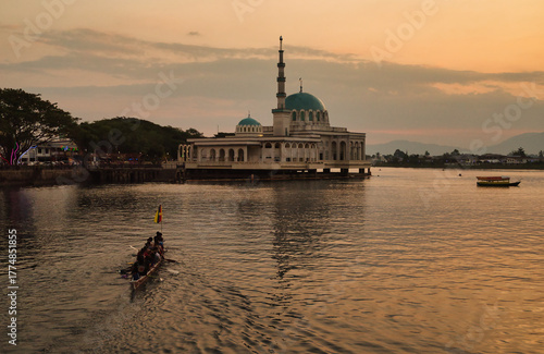  The floating mosque of Kuching, also known as Masjid Bandar Kuching or Masjid India, at sunset, located on the Sarawak River in Kuching, on the island of Borneo, Malaysia. 