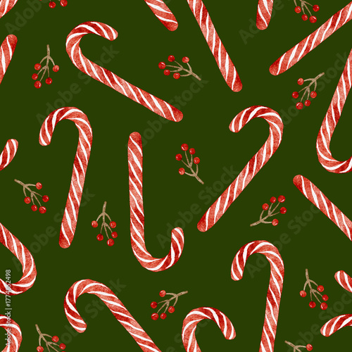 Festive pattern with candy canes and berry sprigs.