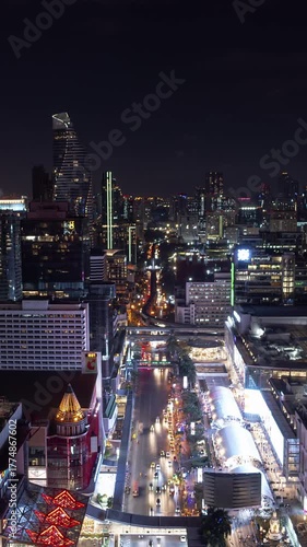 night illumination bangkok city downtown traffic street aerial panorama 4k vertical timelapse thailand 