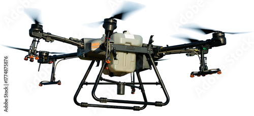 Agricultural technology smart farm concept. Farmer technicians remotely fly agricultural drones to fly to spray fertilizer in fields.