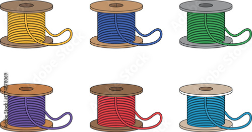 A selection of colorful spools of thread for sewing and crafts.