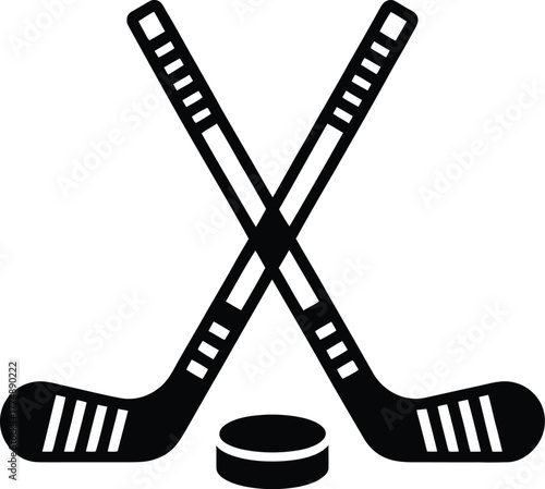 Two hockey sticks crossed with a puck.