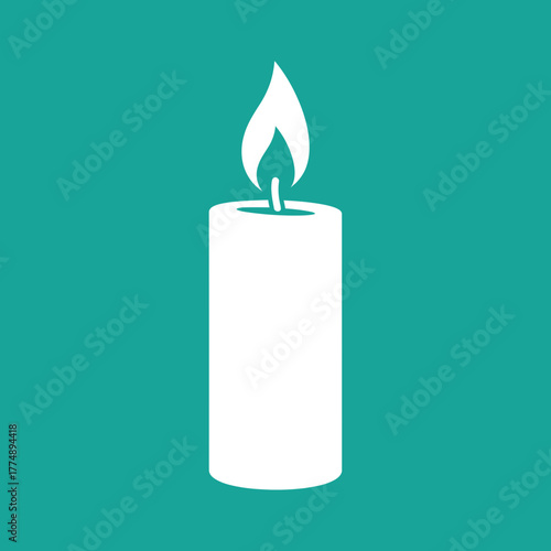 White candle with flame on teal background