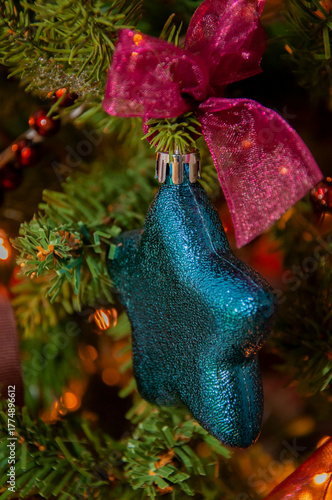 Colorful Christmas decoration on celebration tree at home party. December vibe. Winter happy holiday