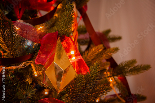 Xmas party 2026. Christmas tree decoration at home for Xmas with colorful decor and lights