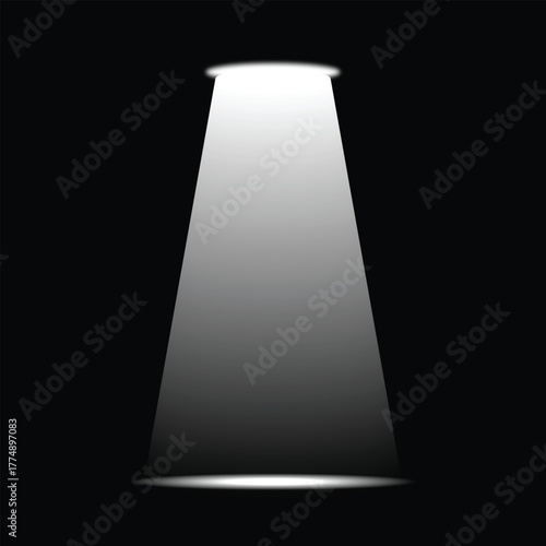A bright spotlight illuminating from above a dark background. The light beam creates a sense of focus and attention