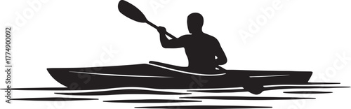 Silhouette of a person kayaking on water