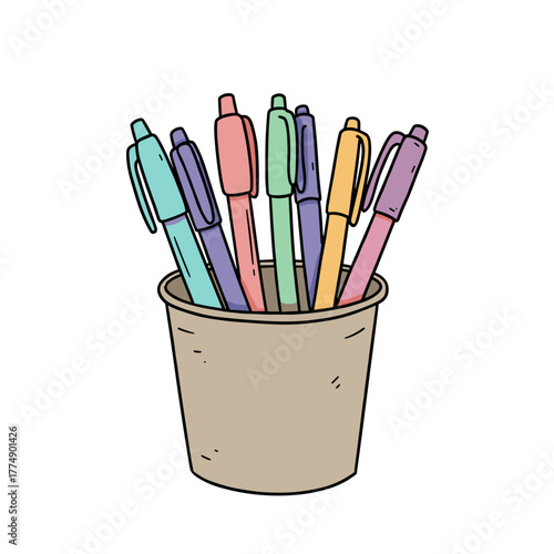 Colorful pens arranged in a cup for writing and office use  