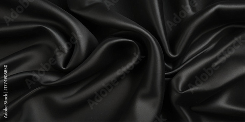 Luxurious black smooth silk or satin texture background. Black silk wave and curve background.	