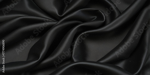 Black silk satin background. abstract black silk texture background with flowing wavy patterns and smooth

