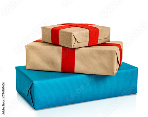Stacked gift boxes with red ribbon closeup