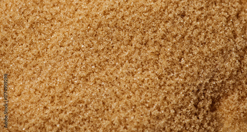 Brown Cane sugar background close up. Brown sugar backdrop, texture. Heathy eating, diet concept. Top view, flat lay