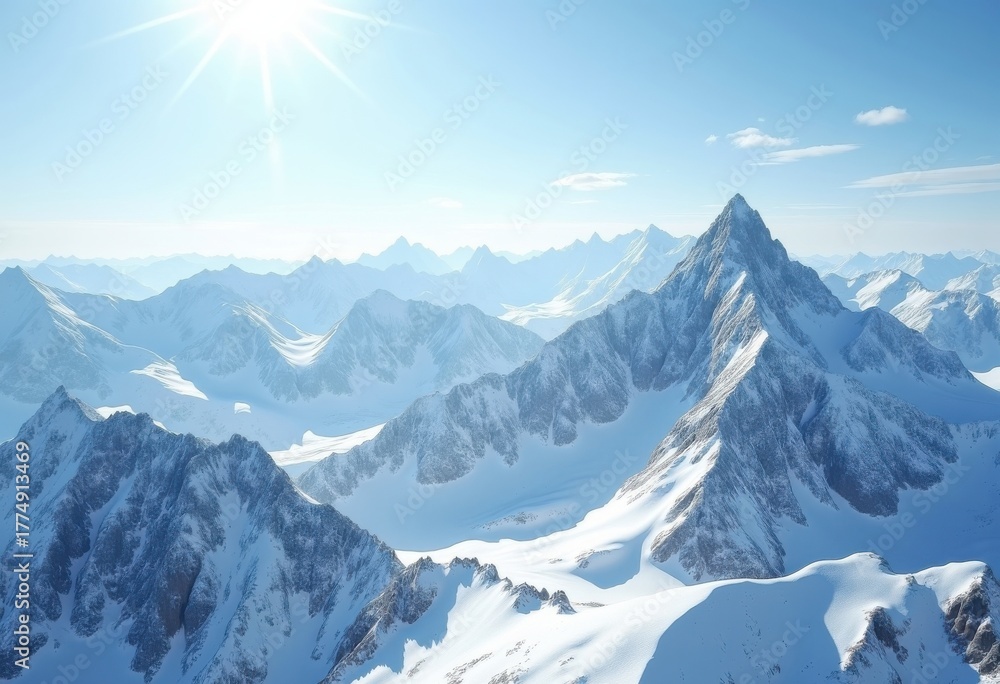 Obraz premium Snow-Capped Majesty: Rugged Range Exuding Frosty Grandeur Under Brilliant Blue Sky
