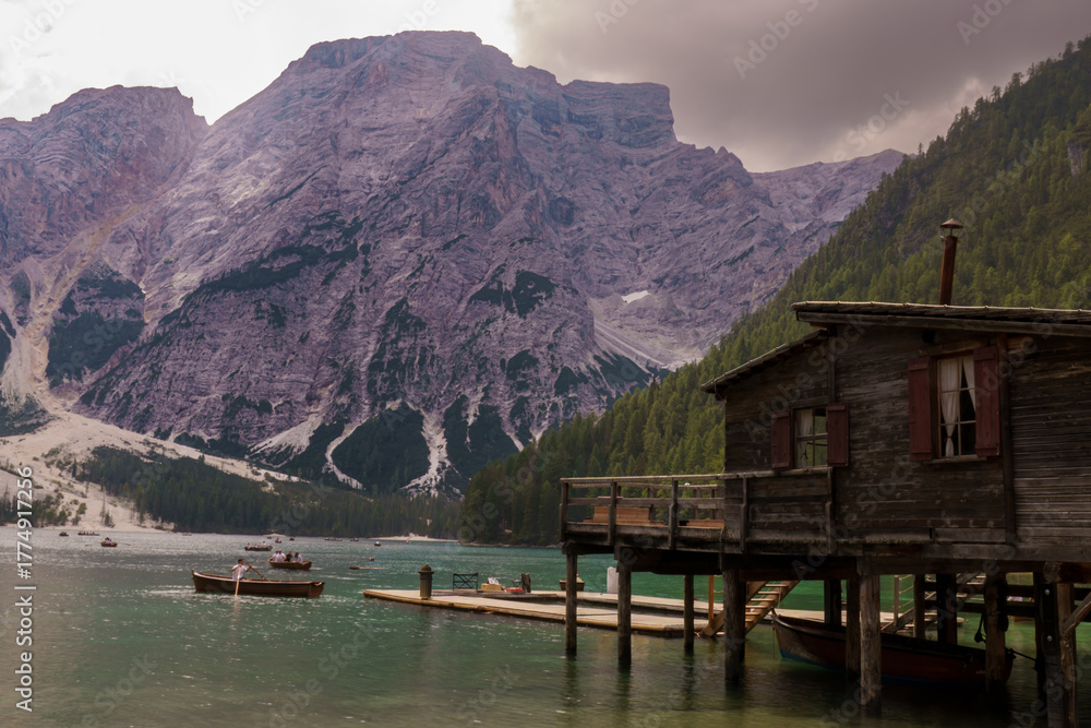 Fototapeta premium Wooden Boathouse on Lago di Braies, Dolomites, Italy