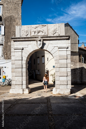 Old stone Porta Marcella gate in the town of Cres, Croatia