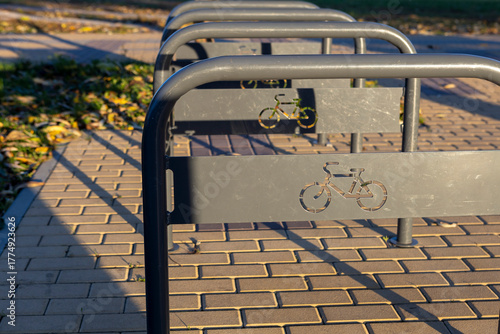 Empty bicycle parking lot in a city park.