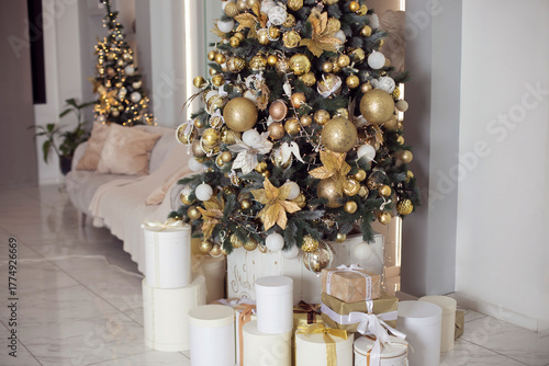 Christmas and New Year home decoration in white and golden colors