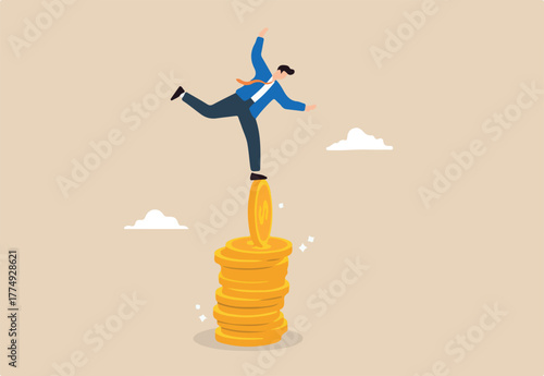 Businessman balancing on unstable stacks of coins